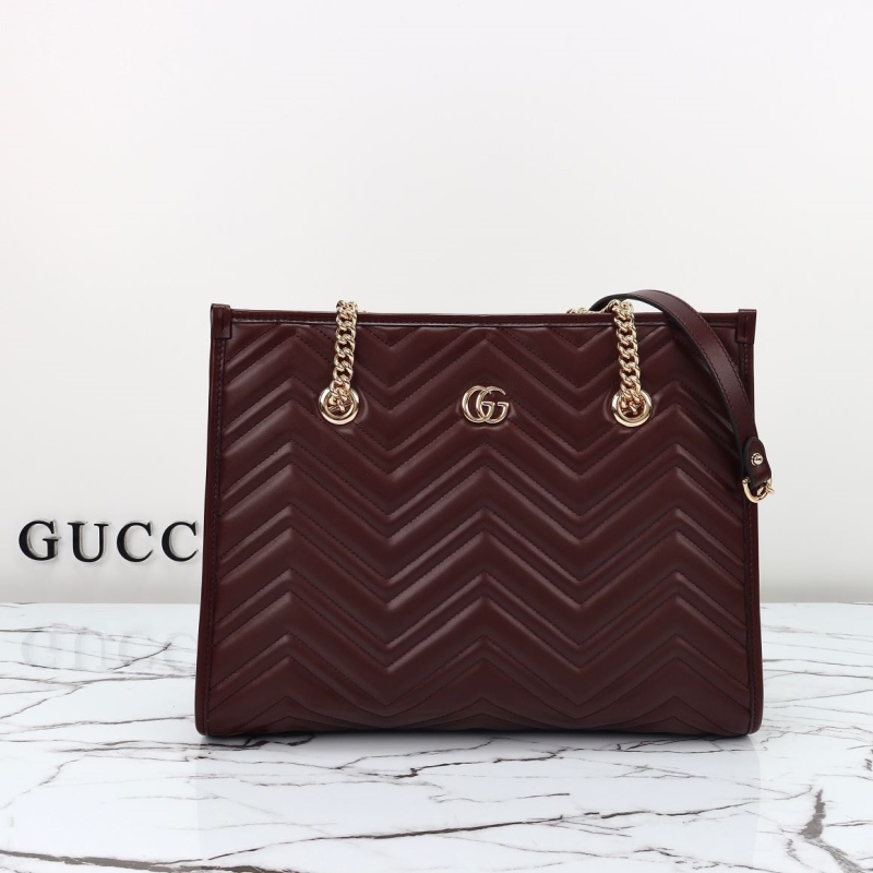 G*u*i shopping bags